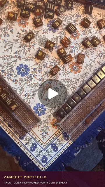 Tala mahjong setting with blue floral patterned mat and dark tiles
